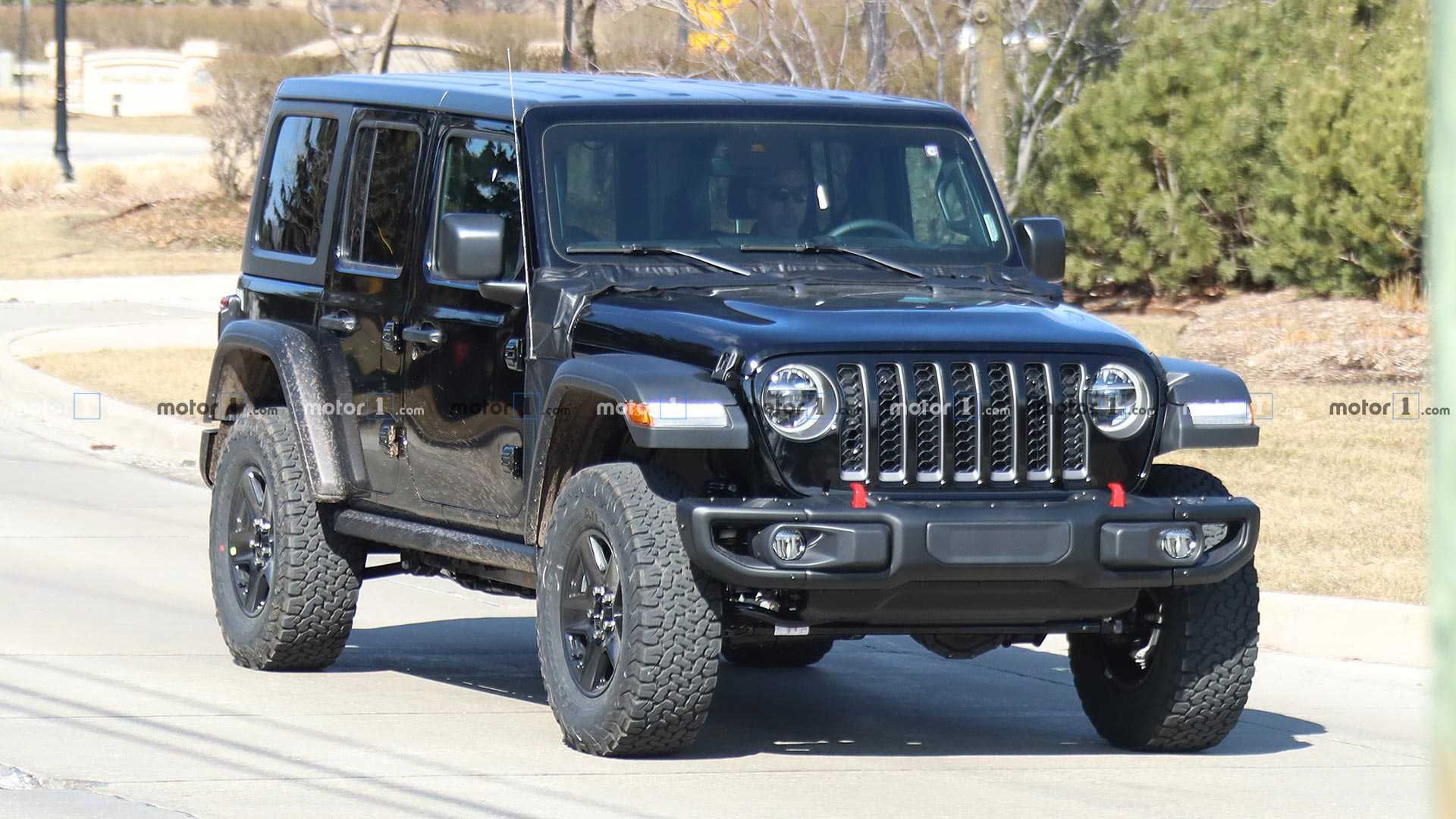 Jeep Kenalkan Wrangler Versi Ramah Lingkungan 1 jeep wrangler plug in hybrid spied for first time