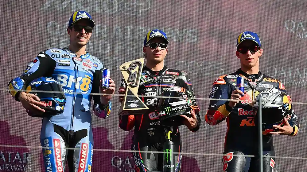 Klasemen MotoGP Portugal 2025 Usai Race Utama Minggu 1 Podium MotoGP Portugal - Marco Bezzecchi - Alex Marquez - Pedro Acosta