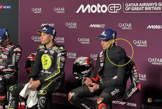 Marco Bezzecchi with Ice Pack in Press Conference
