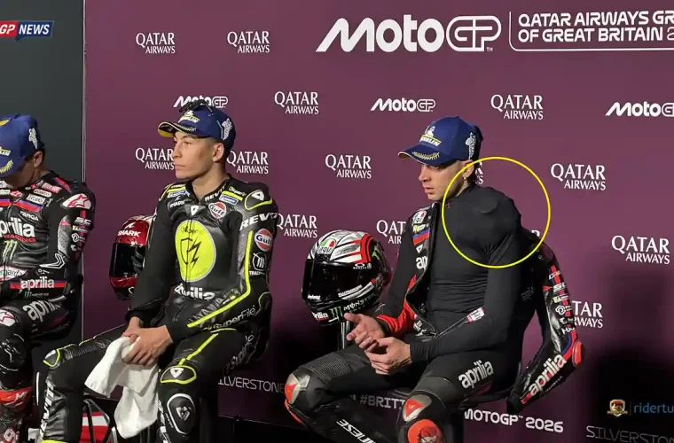 Marco Bezzecchi with Ice Pack in Press Conference